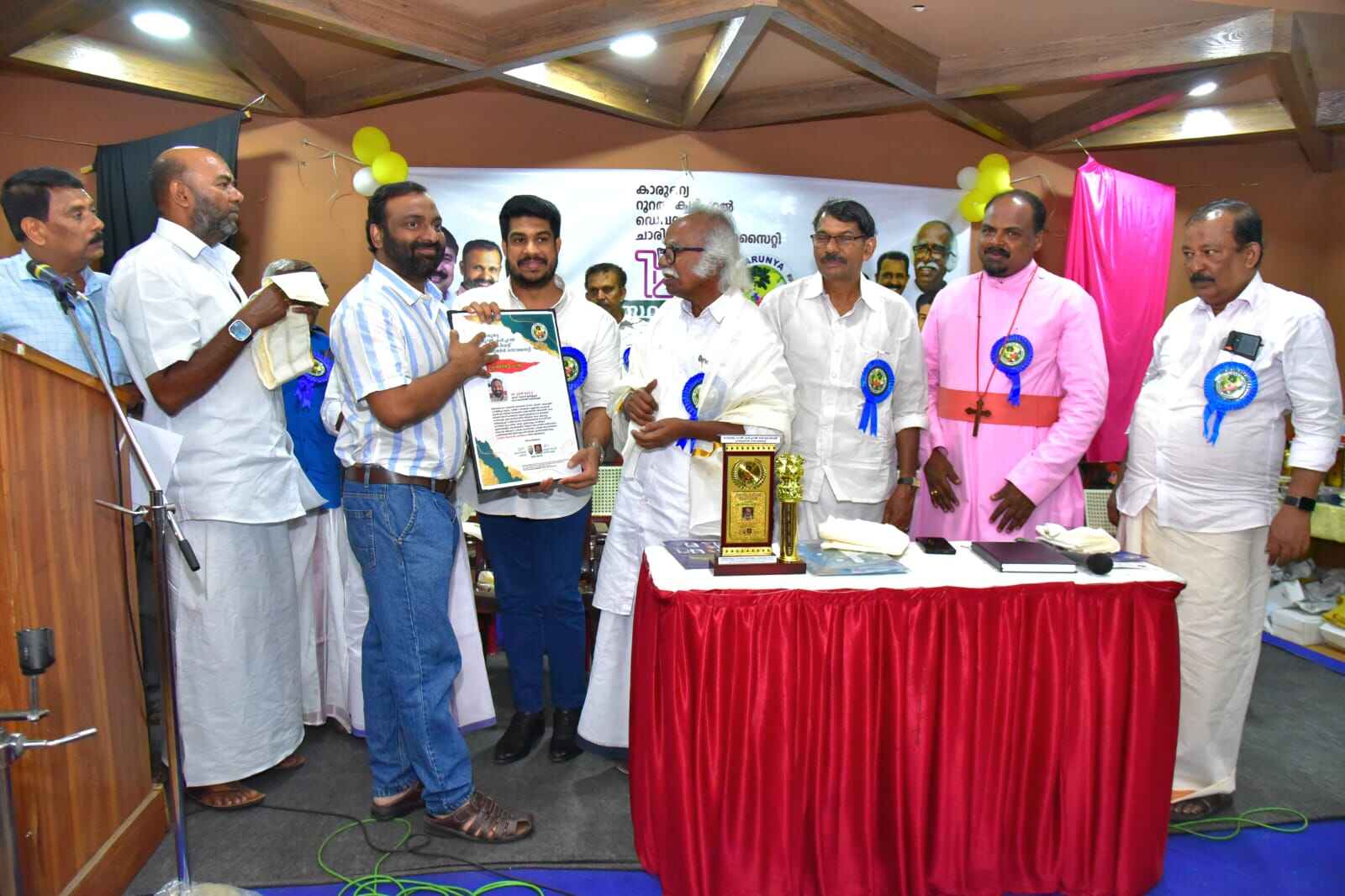Distributing sarees and clothing to women at our Clothing Distribution Event, 2024