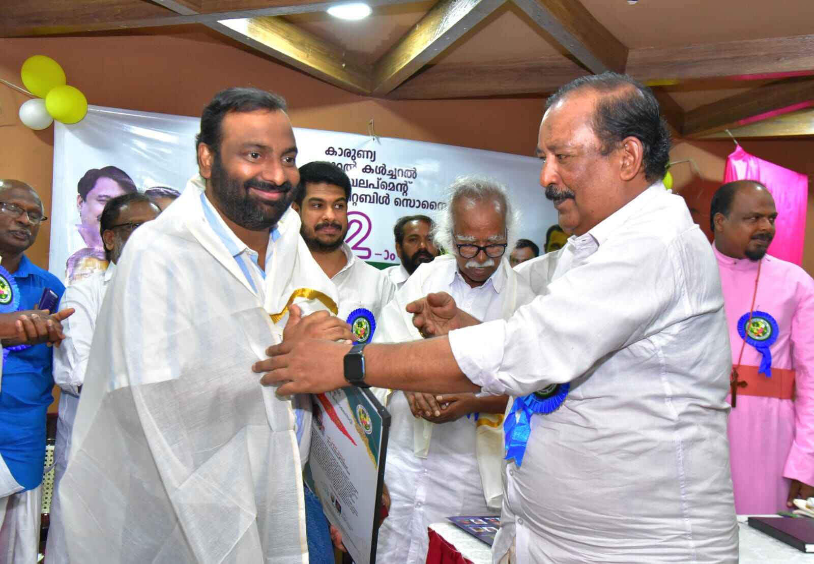 Distributing sarees and clothing to women at our Clothing Distribution Event, 2024