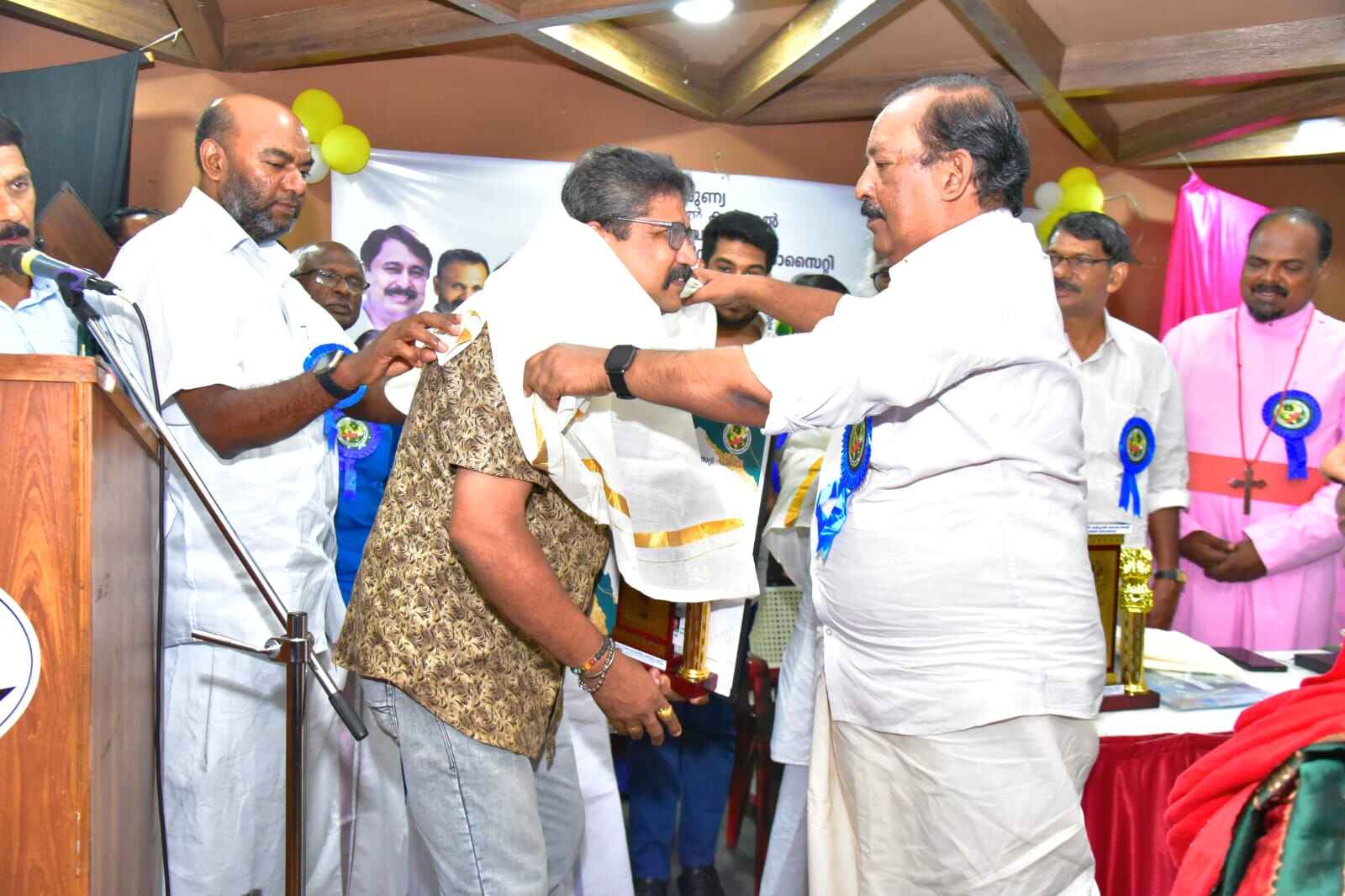 Distributing sarees and clothing to women at our Clothing Distribution Event, 2024