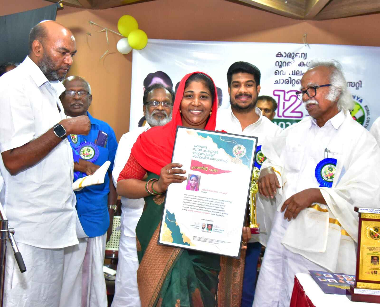 Distributing sarees and clothing to women at our Clothing Distribution Event, 2024