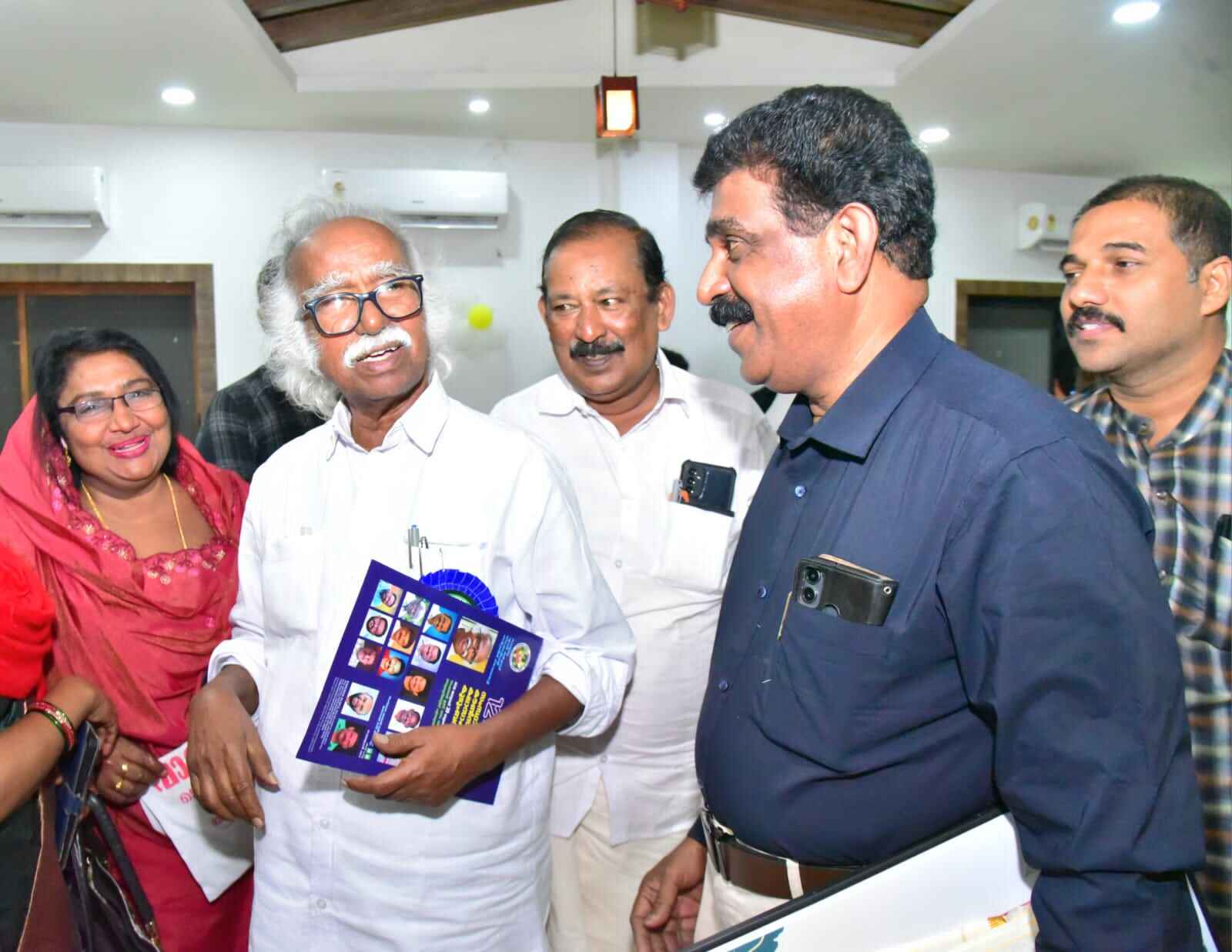 Distributing sarees and clothing to women at our Clothing Distribution Event, 2024