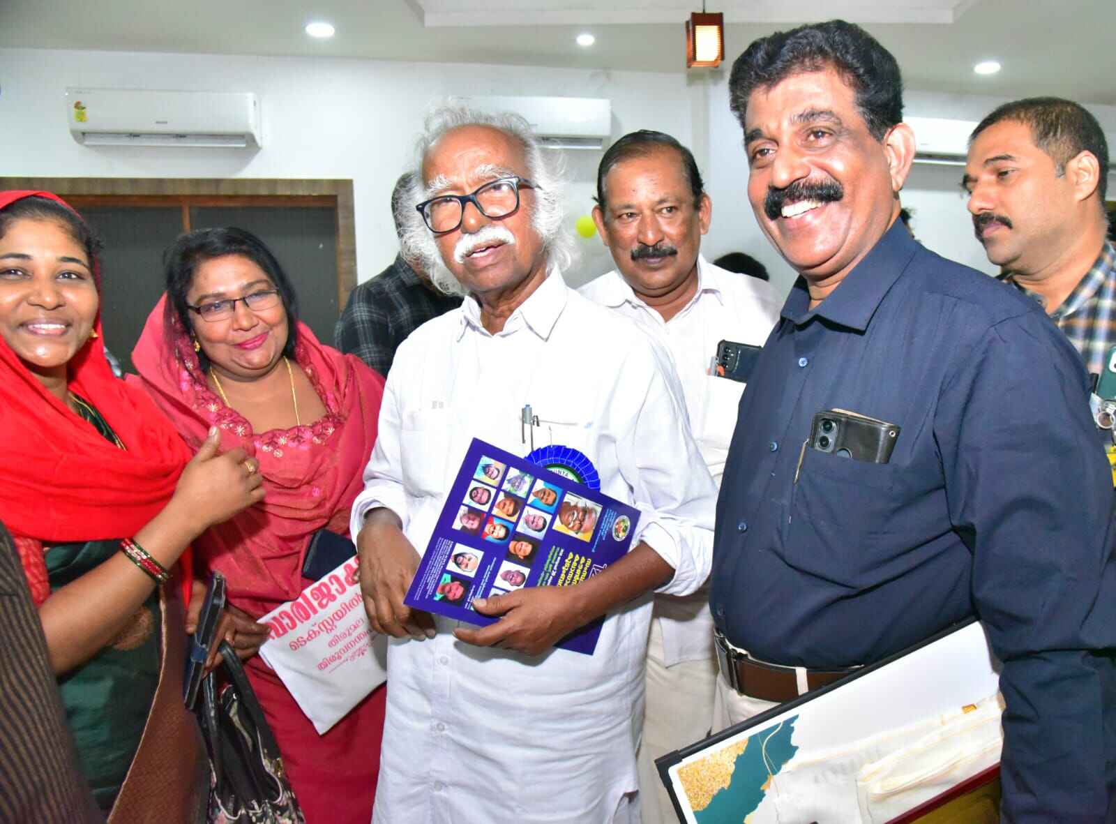 Distributing sarees and clothing to women at our Clothing Distribution Event, 2024