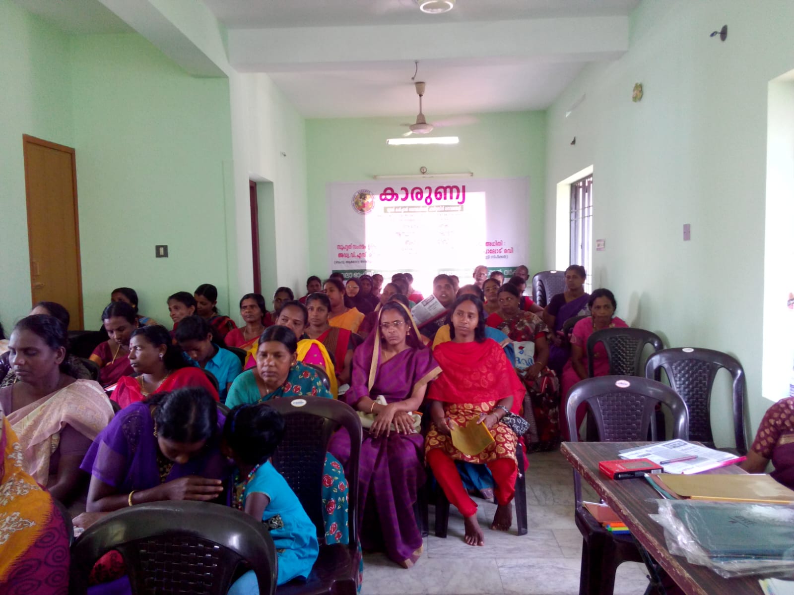 Distributing sarees and clothing to women at our Clothing Distribution Event, 2024